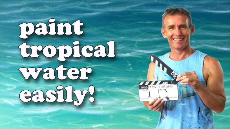 a man holding a clapstick in front of the ocean with words paint tropical water easily