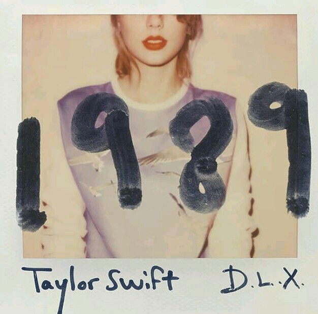 taylor swift cd cover with japanese writing on it