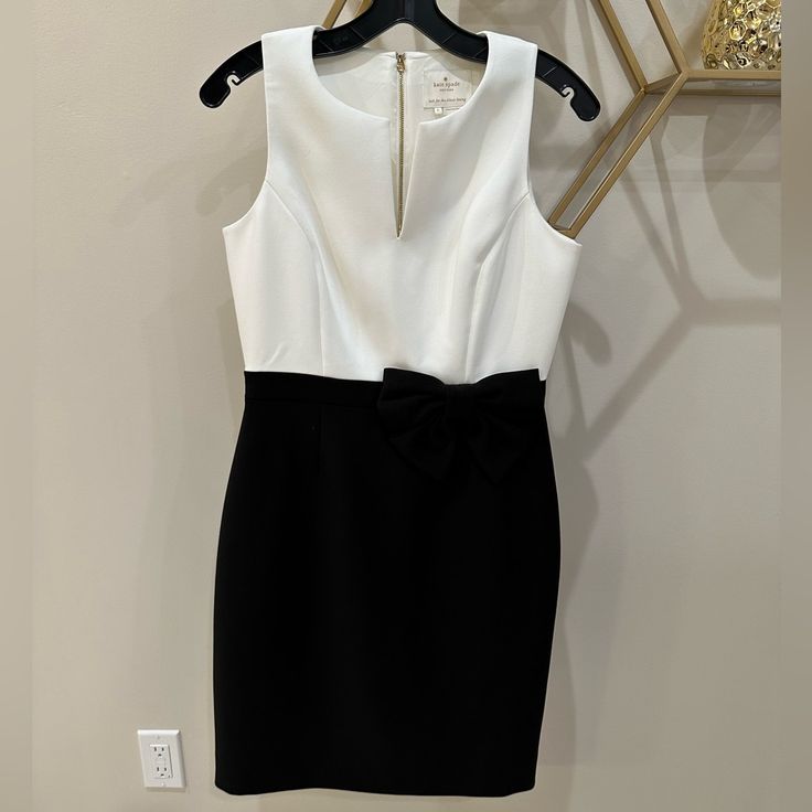 Bought For A Holiday Party And Never Worn. Beautiful Kate A Spade Black And White With Bow And Gold Zipper. Back Vent Still Stitches Shut. Fitted Mini Length Dress For Black-tie Events, Fitted Black And White Cocktail Dress, Black And White Mini Evening Dress, Elegant Black And White Knee-length Dress, Formal Black And White Mini Dress, Black And White Sleeveless Evening Mini Dress, Black And White Mini Dress For Evening, Elegant Black And White Mini Dress, Black And White Mini Dress For Party