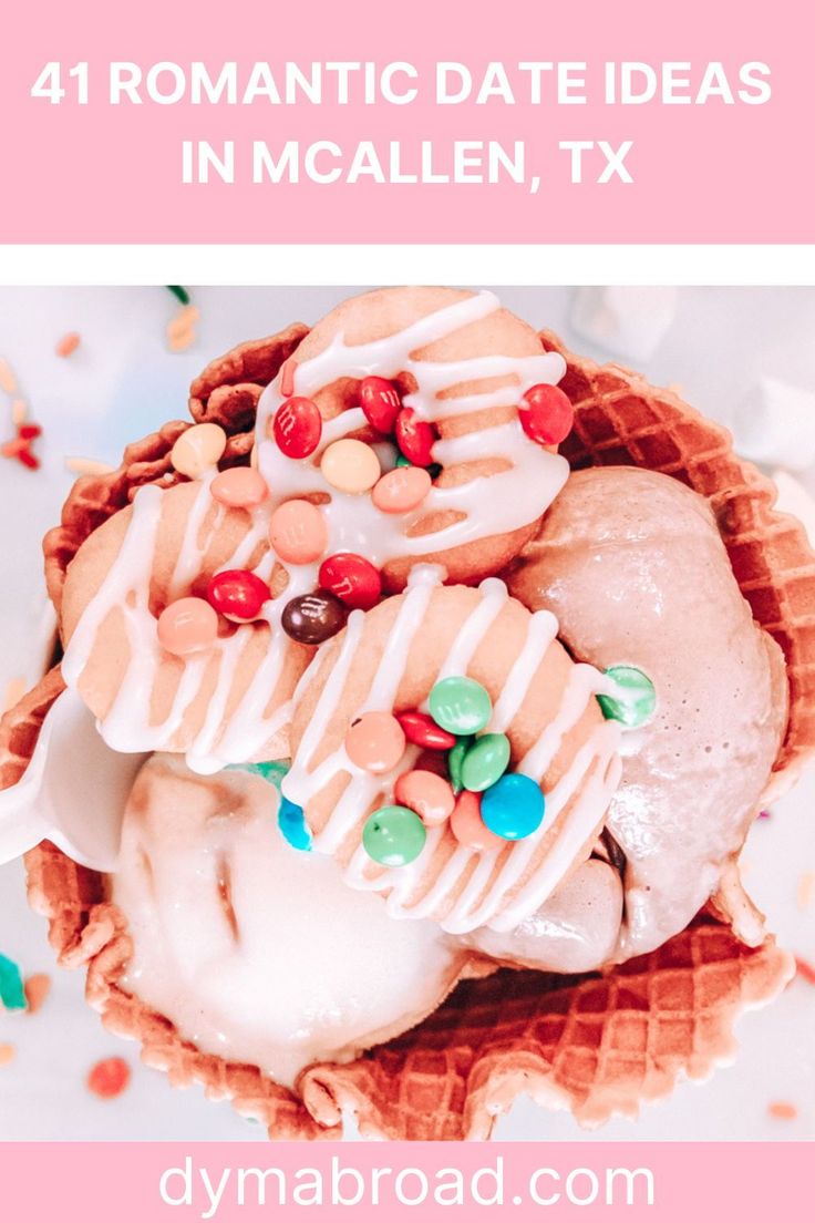 an ice cream sundae with white icing and sprinkles on top