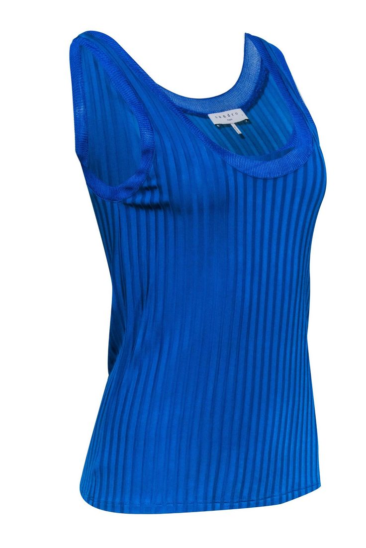 Get summer ready with Sandro's blue ribbed tank. This sleeveless tank features a blue ribbed knit for a stylish touch. Perfect to style with denim shorts or linen pants and slide sandals for a effortless and chic look. Don't miss out! Size S (1) Shell 96% Viscose, 4% Elastane Trim 100% Viscose Unlined Pullover Ribbed knit Bust 28" Waist 29" Shoulder to hem 24.5" Summer Ribbed Fitted Tank Top, Blue Ribbed Tank Top For Summer, Fitted Ribbed Tank Top For Summer, Stretch Ribbed Tops For Summer, Trendy Ribbed Tank Top For Spring, Summer Ribbed Stretch Tank Top, Summer Stretch Ribbed Tank Top, Ribbed Stretch Tank Top For Summer, Ribbed Tank Top For Spring