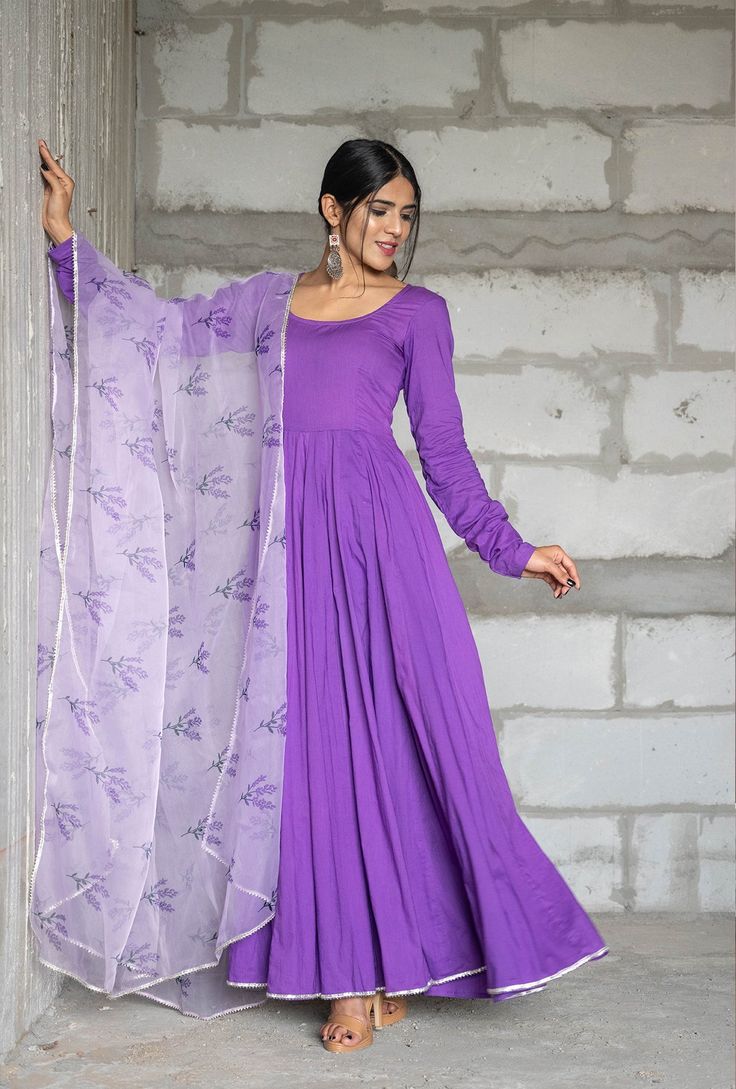 PRODUCT DESCRIPTION :-Festive celebration here we come in this beautiful iris purple anarkali. The iris purple color and lavender organza dupatta are making this anarkali more beautiful.Anarkali :- CottonPant :- CottonDupatta :- Organza silkColor:-Anarkali and dupatta - Purple Pant - PurpleCare Instructions :- Dry clean onlyModel Size :- Model is wearing XS sizeModel Height :- 5.6''DISCLAIMER :- Slight color variations may occur due to different screen resolution. Purple Anarkali Set With Traditional Drape, Designer Purple Kurta With Cutdana Details, Purple Kurta With Cutdana For Navratri, Traditional Drape Purple Kurta With Cutdana, Traditional Purple Floor-length Kurta, Bollywood Lavender Anarkali Set With Resham Embroidery, Purple Resham Embroidery Salwar Kameez For Navratri, Lavender Wedding Kurta With Resham Embroidery, Wedding Lavender Kurta With Resham Embroidery