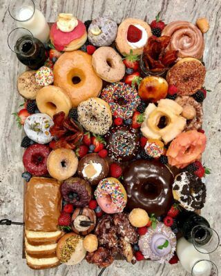 there are many different types of donuts on the table