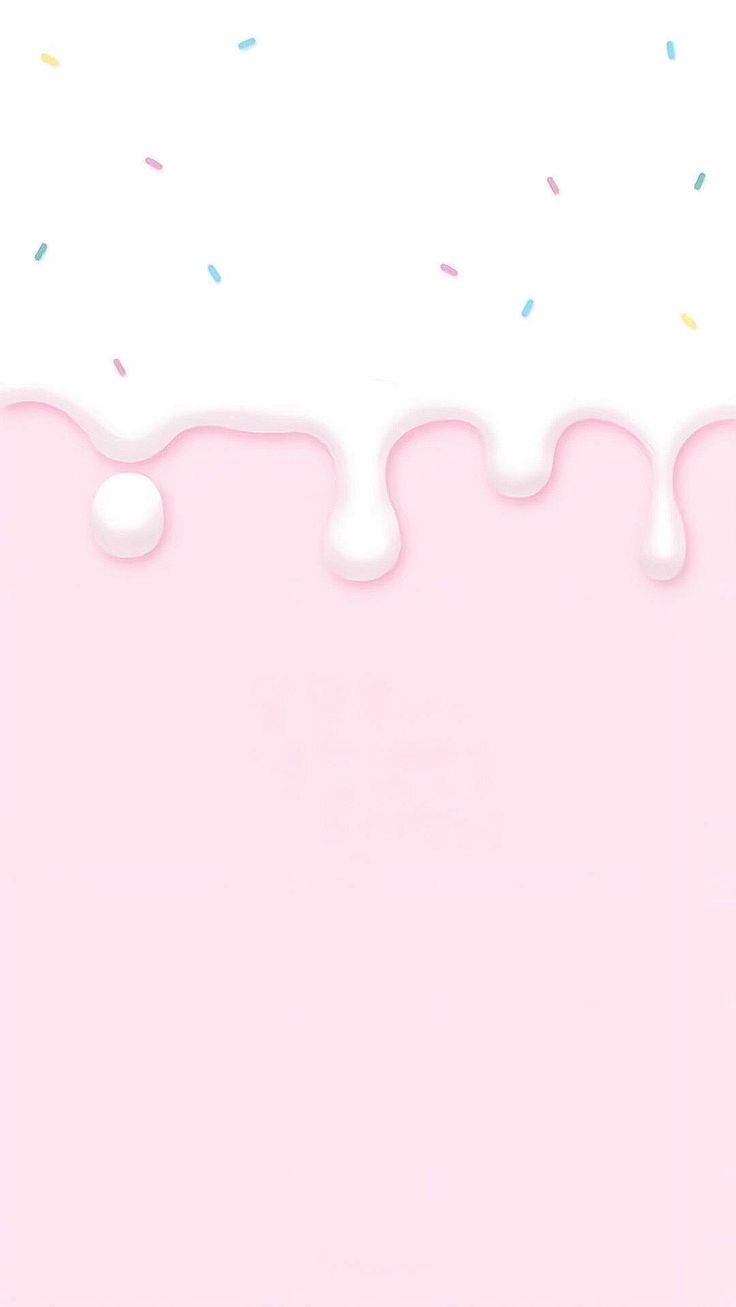 a pink cake with sprinkles on top and white frosting over it