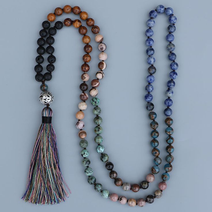 1 pc. Stones: Lava Rock, Phoebe Nanmu Stone, Zebra Stone, African Turquoise, Rhodochrosite, Mosaic Quartz, & Sodalite. Pendant Size: 12cm Pendant Metal: Zinc Alloy Bead Size: 8mm Length: 112cm Natural stone mala necklace unisex yoga meditation long tassels bead necklace Agate Beaded Bracelets With 108 Beads For Meditation, Traditional Mala With Gemstone Beads For Healing, Beaded Mala Amulet For Meditation, Beaded Amulet Mala For Meditation, Adjustable Polished Beads Necklace For Rituals, Adjustable Polished Bead Necklaces For Rituals, Spiritual Healing Mala With Round Beads, Multicolor Spiritual Long Beaded Necklaces, Traditional Mala With Natural Stones For Meditation