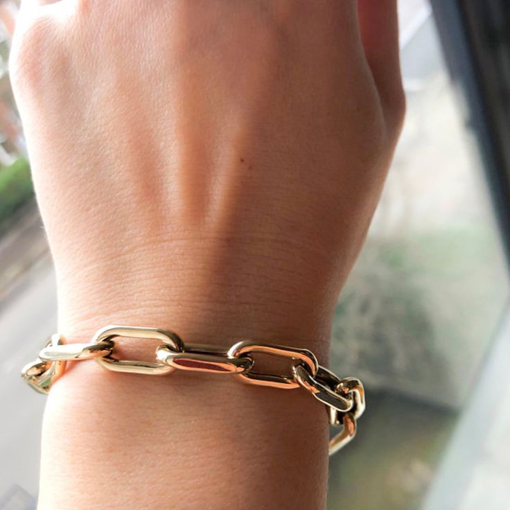 This Italian handcrafted chain link bracelet is completely composed of 14K solid gold and is uniquely made with a semi-hollow interior for comfortable everyday wear that will not dent. This bracelet is available in a variety of different length options. Total Length: your choice of 6.5, 7, 7.5, 8 or 8.5 inches Link Dimensions: approximately 8mm (W) x 17mm (L) x 2.65mm thick Weight: approximately 12.75 grams of 14K solid gold in the 8" option Metal Finish: High Shine Polish This design is current Rose Gold Oval Link Paperclip Bracelet, Oval White Gold Bracelet As Gift, Oval White Gold Bracelet For Gift, Oval White Gold Bracelet Gift, Rose Gold Cable Chain Bracelet As Gift, Rose Gold Cable Chain Bracelet Gift, Rose Gold Bracelet With Solid Link As A Gift, Rose Gold Cable Chain Bracelet, Luxury Gold Chain Paperclip Bracelet As Gift