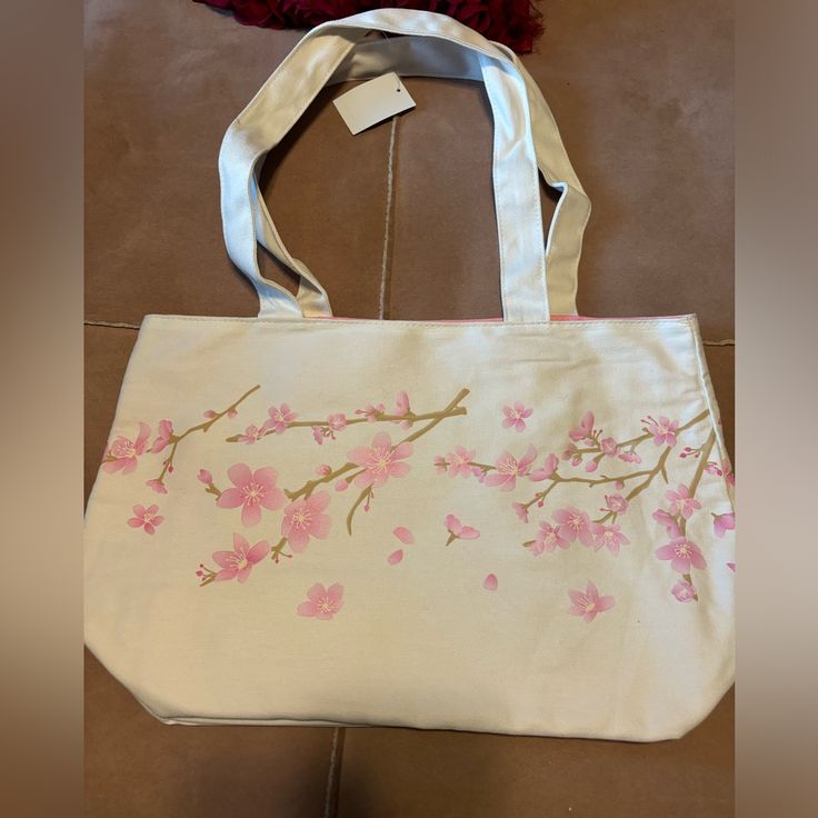 Nwt Tote Bag. Cherry Blossom Print. Inside Bag Is Lined In Pink With Zippered Pocket. Beautiful Bag Large Capacity Canvas Bag For Spring, White Canvas Bag For Spring, Spring Floral Print Canvas Bag, Pink Cotton Shoulder Bag For Spring, Spring Pink Cotton Shoulder Bag, Spring Shopping Canvas Bag, Spring Canvas Shopping Bag, Spring Floral Canvas Shopping Bag, Spring Travel Canvas Bag