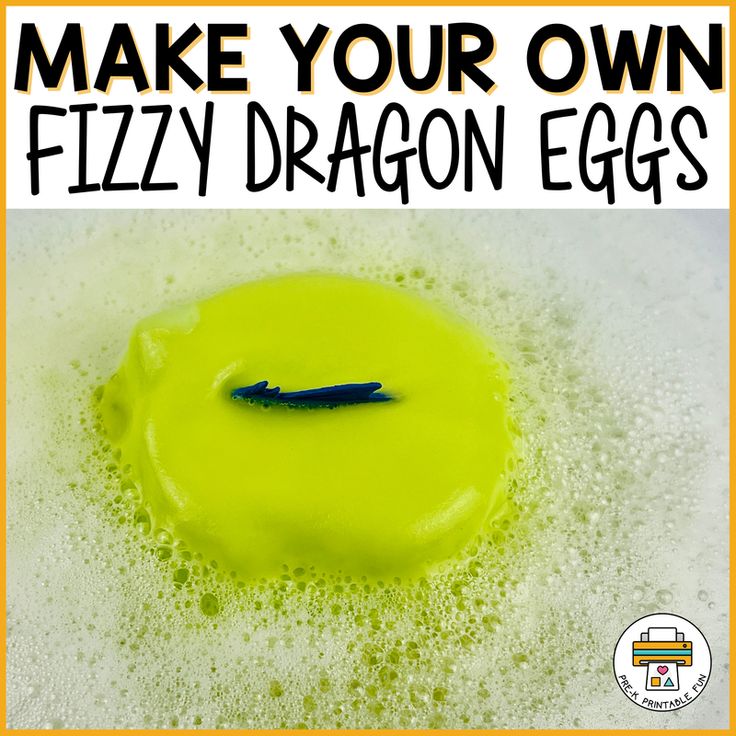 an egg is sitting in the middle of a bowl with green liquid on it and text overlay reads make your own fizzy dragon eggs