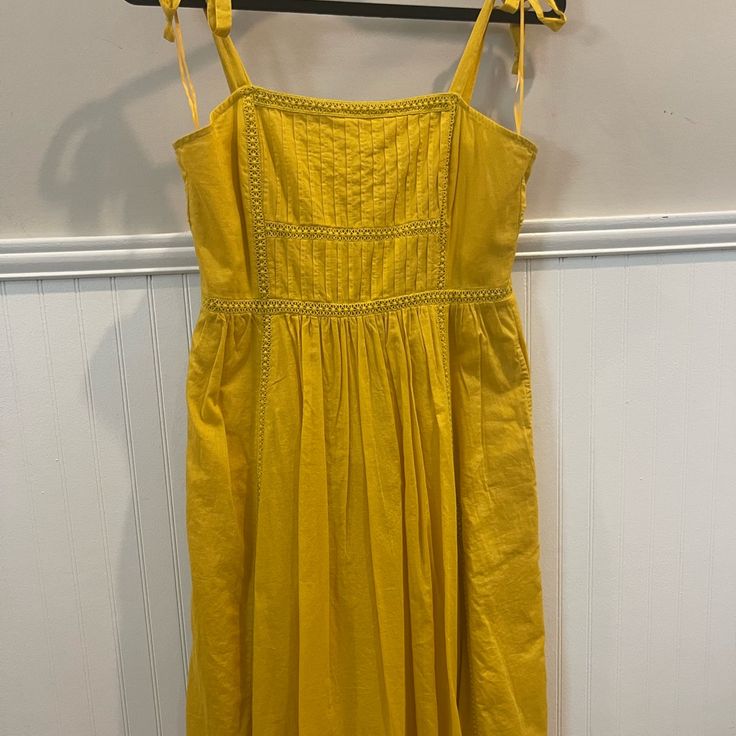 Golden Yellow Dress Nwt Casual Yellow A-line Dress, Chic Yellow Cotton Sundress, Mustard Sleeveless Dress For Brunch, Chic Yellow Cotton Dress, Yellow A-line Sundress For Day Out, Yellow A-line Midi Dress, Yellow Summer Midi Dress Knee-length, Sleeveless Mustard Dress For Brunch, Sleeveless Mustard Dresses For Brunch