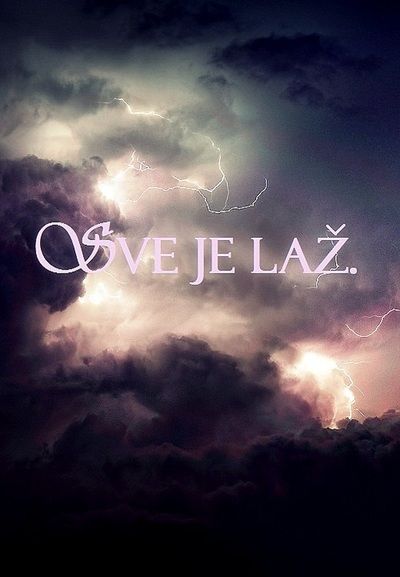 the word ove jelaz is written in front of storm clouds and lightning