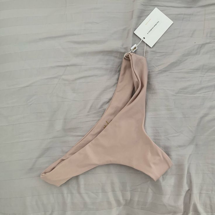 Never Worn! New With Tags! Coco (Nude) Color Bikini Bottoms. Cute And Comfy Brazilian Seamless Cut. I Own Many Other Midori Bikini Bottoms And Tops And They Are So Comfy! Best For Both Active Days In The Sun And Casual Tanning Days. I Wear A 24/25 In Jeans/Bottoms Chic Seamless Beach Bottoms, Chic Beige Stretch Swimwear, Beige Seamless Swimwear For Beach, Seamless Beige Swimwear For Beach, Seamless Beige Swimwear For Spring, Beige Seamless Bottoms For Beach, Spring Seamless Beige Swimwear, Beige Stretch Swimwear Bra Friendly, Seamless Beige Swimwear For Summer