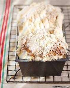 a cake sitting on top of a cooling rack