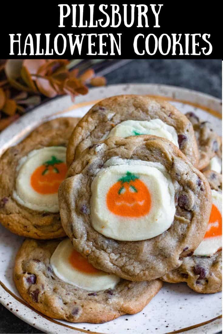 these cookies are decorated with white chocolate and orange candy