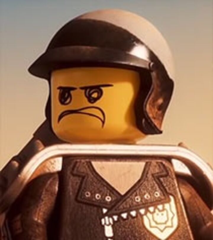 the lego movie character is wearing a helmet