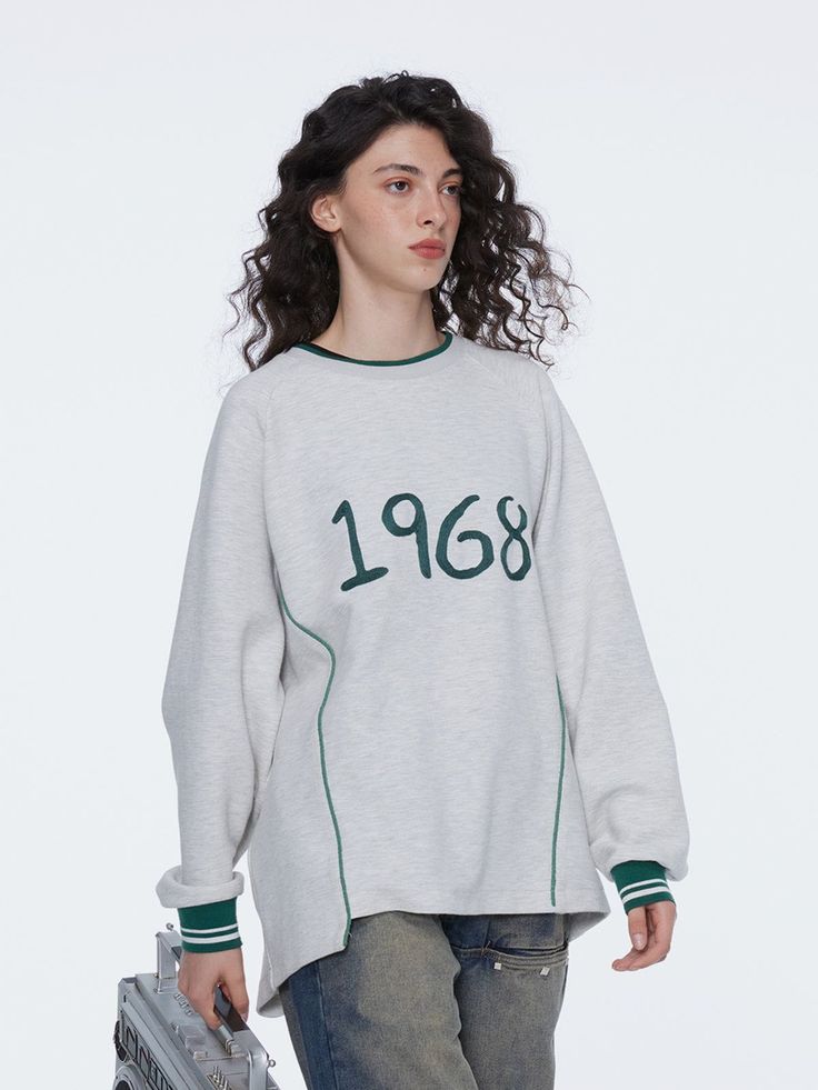 The Aelfric Eden Embroidery Number Sweatshirt, featuring the impressive embroidery of the number "1968" at its center, is an incredibly alluring fashion choice. This sweatshirt combines advanced hand-embroidery craftsmanship with innovative patchwork techniques, presenting a unique and enchanting sense of style. Its minimalist design exudes sophistication, adding a touch of distinctive luxury to your attire.
Material: 100% Cotton.

Clothing details: Number.



SIZE GUIDE Winter Varsity Long Sleeve T-shirt, Winter Streetwear Tops With Raglan Sleeves, Casual Long Sleeve Sweater With Letter Embroidery, Trendy Long Sleeve Sweatshirt With Letter Embroidery, Long Sleeve Tops With Letter Embroidery For Streetwear, Oversized Tops With Letter Embroidery For Streetwear, Varsity Long Sleeve Tops For Streetwear, Cotton Raglan Sleeve Sweatshirt For College, Oversized Long Sleeve Tops With Embroidered Logo