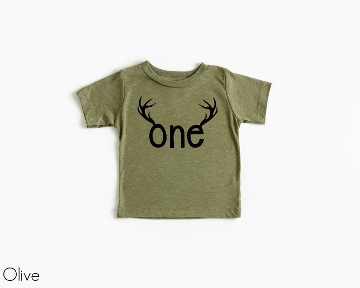 a green t - shirt with the word one printed on it and antlers in black