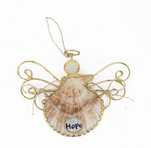 an ornament shaped like a shell with the word hope on it's side