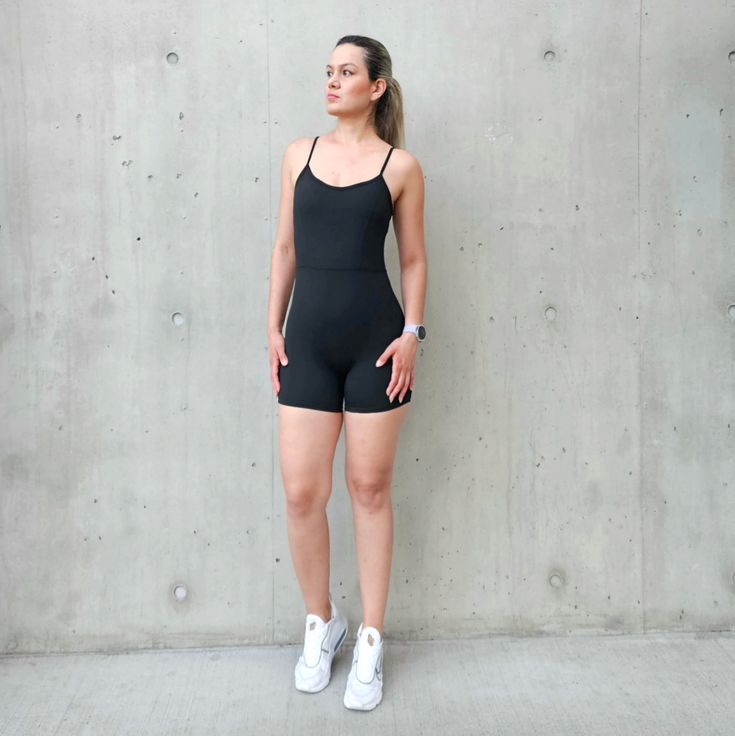 The softest touch for the summer time. The Candice Jumpsuit is the perfect addition to your wardrobe. Crafted with ultra soft and sweat wicking fabric, this mid-length short jumpsuit is ultra-sexy and squat-proof, giving you complete confidence in any situation. Whether you're heading to your favourite workout class or a day full of adventures, you'll be turning heads in this stylish, comfortable and flattering jumpsuit. Compressive Sportswear Bodysuit For Workout, Athleisure Bodysuit With Seamless Construction, Compressive Moisture-wicking Bodysuit For Gym, Athleisure Bodysuit For Training, Compressive Athleisure Bodysuit For Sports, Compressive Athleisure Bodysuit For Training, Athleisure Bodysuit For Sports With Seamless Construction, Athleisure Sports Bodysuit With Seamless Construction, Casual Yoga Bodysuit With Built-in Bra