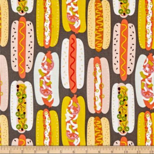 a large pattern of hotdogs and buns on a gray background with yellow, red