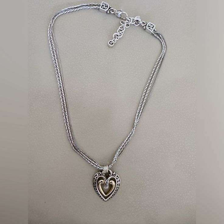 Vintage 925 Pandora Necklace With Triple Chain And Center Gold Plated Swinging Heart. Elegant Silver Heart Necklace With Heart Beads, Elegant Sterling Silver Jewelry With Heart Beads, Elegant 925 Stamped Heart Pendant Jewelry, Elegant Silver Heart Beads Necklace, Elegant Heart Necklace With Silver Chain For Valentine's Day, Elegant Open Heart Stamped 925 Jewelry, Classic Silver Jewelry With Heart Charm, Elegant 925 Stamped Heart Pendant Necklace, Sterling Silver Jewelry With Silver Accents For Gifts