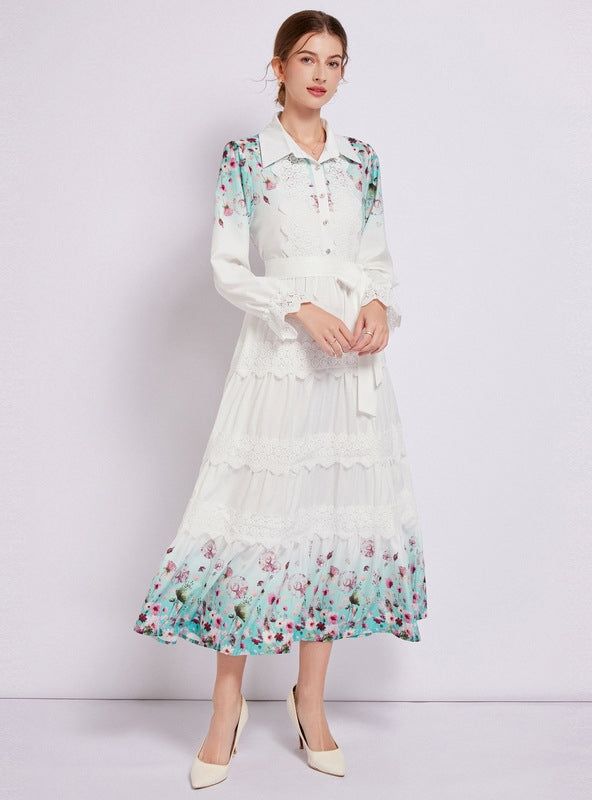 Captivating and ethereal, this enchanting long-sleeved dress is a portrait of bucolic elegance. Its fitted bodice descends into a gently tiered skirt, creating a silhouette that’s both classic and whimsical. The crisp white fabric serves as a canvas for delicate floral patterns that bloom across the hem, lending a touch of springtime regardless of the season. Lace trims add a sophisticated touch, framing the neckline and cuffs with exquisite detail. With a cinched waist accentuated by a self-tie belt, this dress shapes a figure that is both graceful and poised. It’s a versatile piece that transitions seamlessly from a countryside stroll to a chic urban evening. Fabric name: polyester fiberPattern: printingSkirt length: long skirtSkirt type: large swing typeSleeve length: long sleevesColor: White Long Sleeve Dress With Ruffles For Summer, Spring Fitted Long Sleeve Dress With Ruffle Hem, Fitted Long Sleeve Dress With Ruffle Hem For Spring, Spring Long Sleeve Dress With Ruffles, White Long Sleeve Ruffled Dress For Fall, Spring Dress With Lace Trim And Tiered Skirt, Long Sleeve Midi Dress With Ruffle Hem For Daywear, Long Sleeve Dresses With Lace Trim For Garden Party, White Long Sleeve Maxi Dress With Ruffle Hem