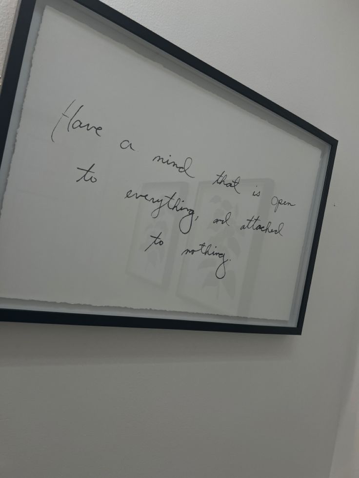 a white board with writing on it in a room