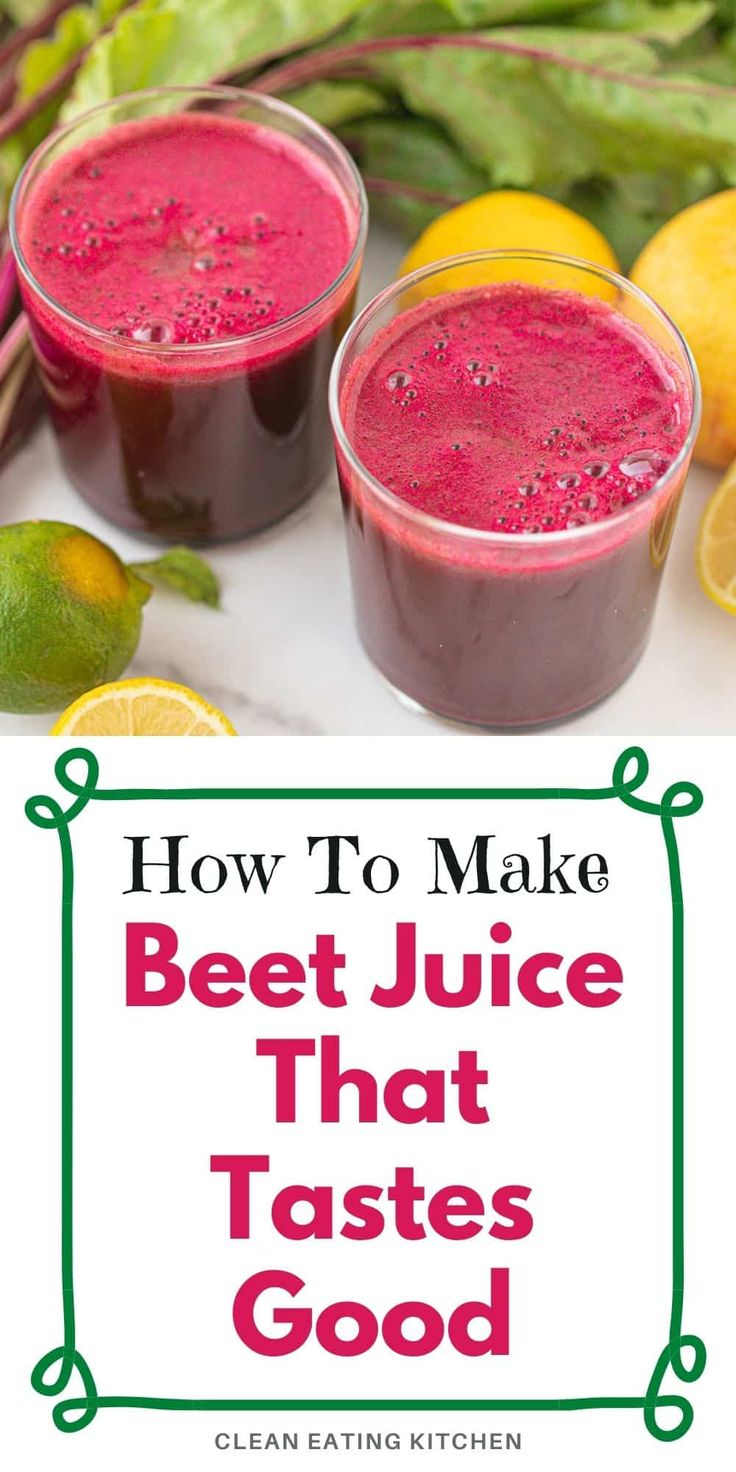 two glasses filled with beet juice sitting on top of a table next to lemons and