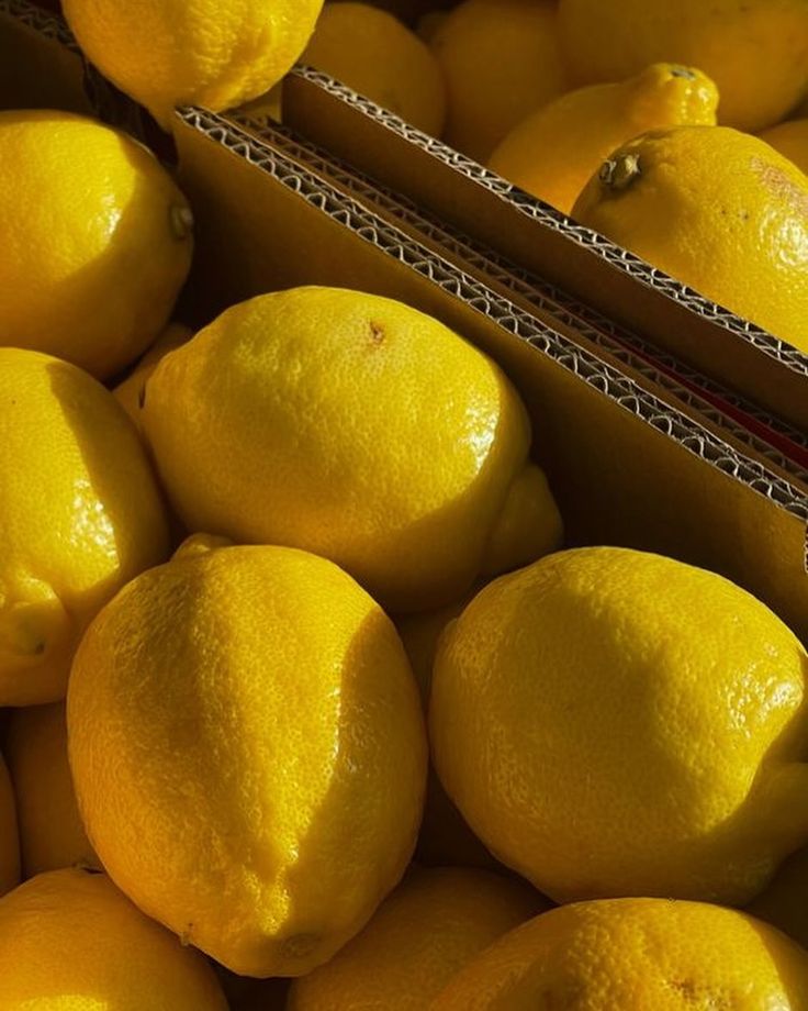 a pile of lemons sitting next to each other