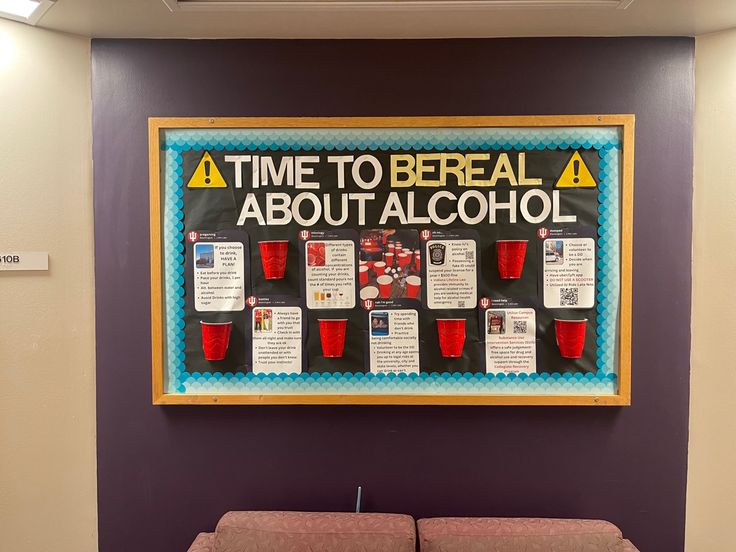 there is a sign on the wall that says time to be real about alcohol and red cups