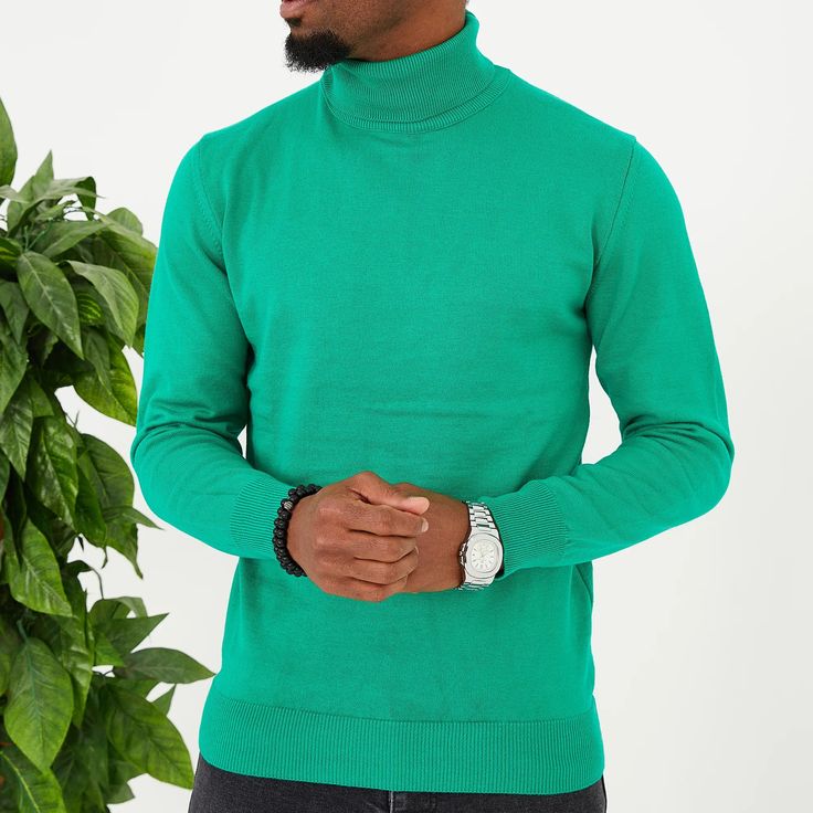 Slip into comfortable designer stylings in this handsome long-sleeved turtleneck with a traditional ribbed cuff design for versatility when paired with casual or semi-formal outfits. Winter Solid Color Cotton Turtleneck, Solid Cotton Turtleneck For Winter, Winter Cotton Solid Color Turtleneck, Trendy Long Sleeve Turtleneck With Ribbed Cuffs, Cotton Turtleneck For Winter, Cotton Winter Turtleneck, Long Sleeve Turtleneck For Work In Spring, Spring Neutral Colored Turtleneck With Ribbed Cuffs, Long Sleeve Turtleneck For Spring Workwear