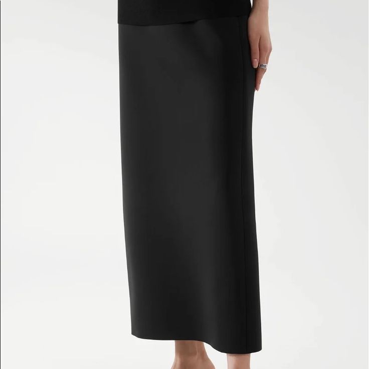 Cos Scuba Black Midi Skirt In Size S Never Worn New W/Tag Black Long Pencil Skirt For Formal Occasions, Black Relaxed Pencil Skirt For Formal Occasions, Solid Relaxed Pencil Skirt For Evening, Relaxed Fit Pencil Skirt For Evening, Black Lined Pencil Skirt For Evening, Elegant Long Black Pencil Skirt, Black Sleek Pencil Skirt For Formal Occasions, Sleek Black Pencil Skirt For Formal Occasions, Sleek Black Flared Skirt Bottoms