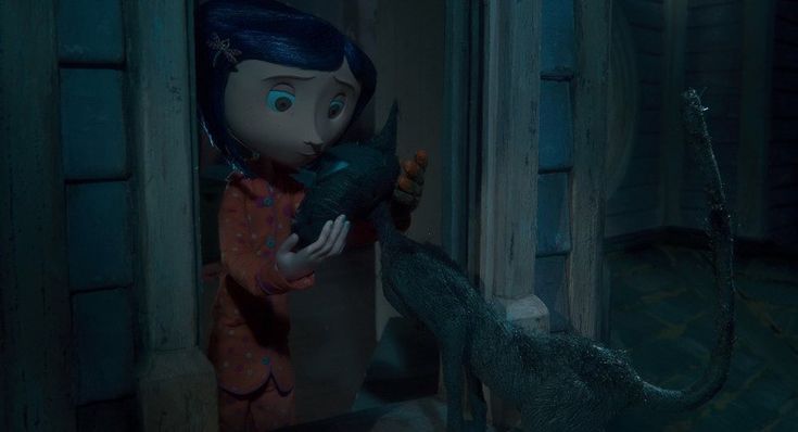 an animated character is holding something in her hand and looking at another creature with its mouth open