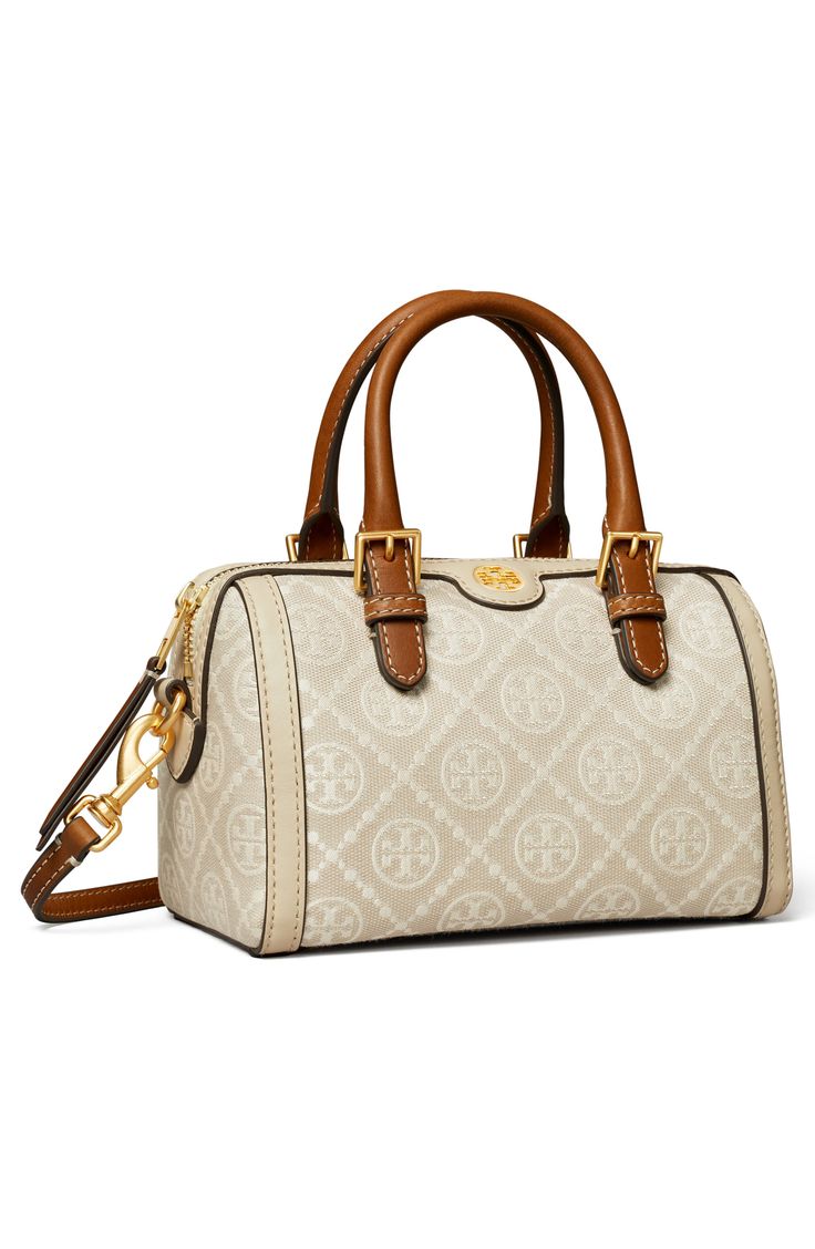 A logo monogram pattern adds distinguished signature style to a structured handbag complete with smooth leather trim. Top zip closure Top carry handles; removable shoulder strap Textile with leather trim Imported Classic Satchel With Top Handle In Coated Canvas, Classic Satchel With Top Handle In Signature Coated Canvas, Classic Satchel With Detachable Strap In Signature Coated Canvas, Beige Monogram Canvas Satchel With Detachable Strap, Formal Satchel With Detachable Strap In Coated Canvas, Formal Satchel With Detachable Strap And Coated Canvas, Beige Monogram Print Bag For Everyday Use, Formal Leather Bag With Monogram Print, Classic Monogram Print Bags For Formal Occasions