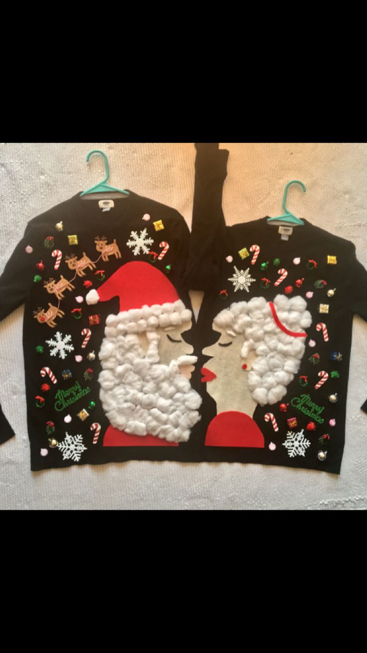 two sweaters with santa and snowmen on them, one is black and the other is white