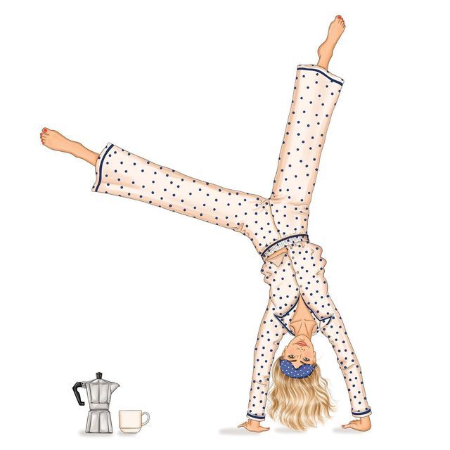 a woman doing a handstand in front of a coffee pot