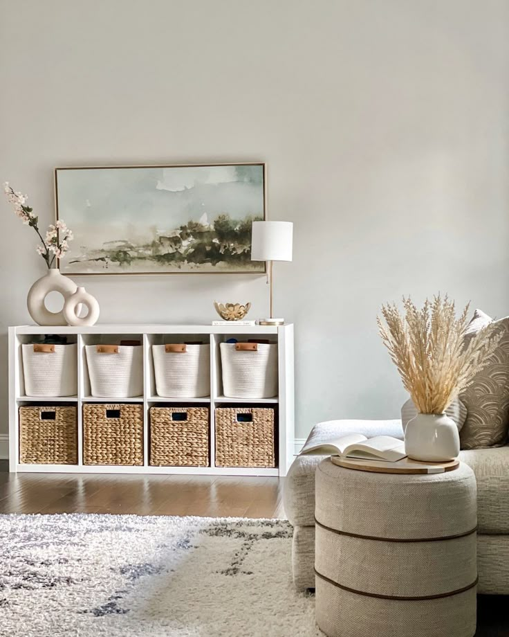 a living room filled with furniture and baskets