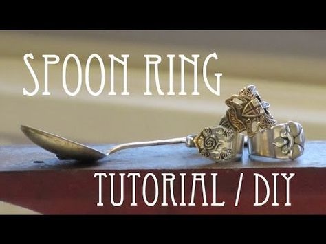 spoon ring sitting on top of a wooden table