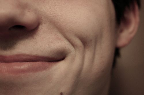 a close up shot of a person's face