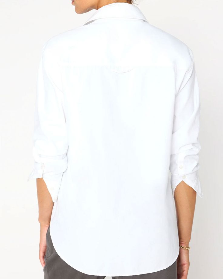 Brochu Walker Salt White Everyday Shirt Collar V neck Long sleeves; extended button cuffs Button down front closure Single chest patch pocket Relaxed fit Rounded hem 65% cotton, 35% polyester Brochu Walker, Long Sleeve Sweater Dress, Stylish Clothes For Women, Back Neck, Classic American, Notched Collar, Short Jumpsuit, Jacket Sale, Ulla Johnson