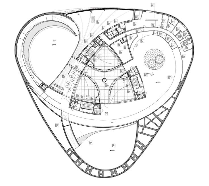 a drawing of a circular building with lots of windows and floor plans on the side