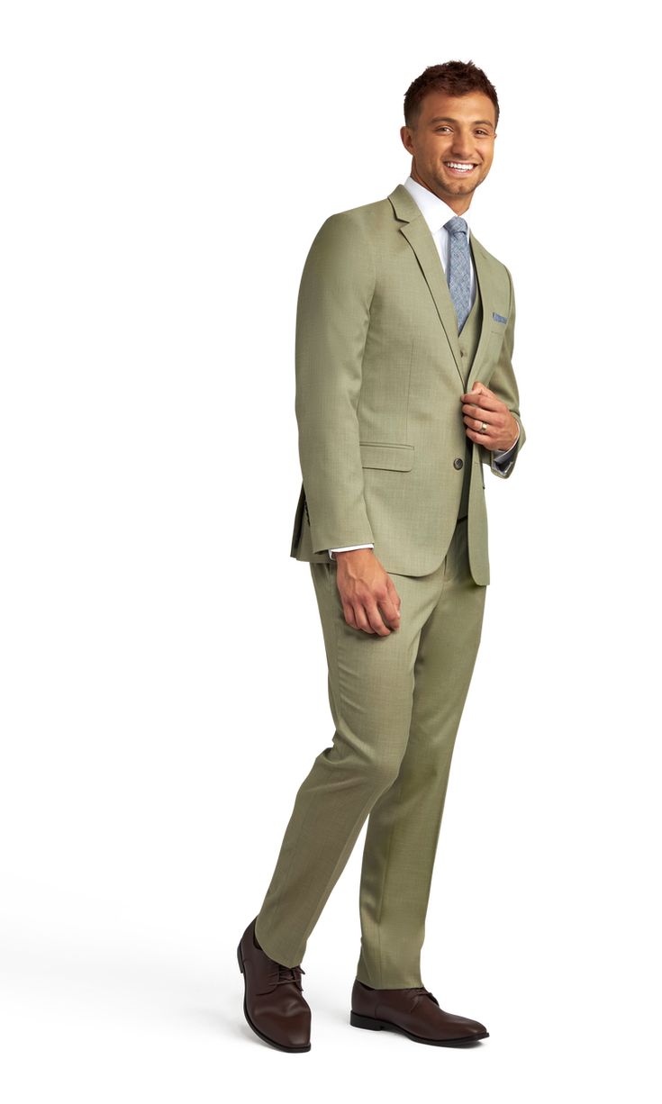 We're loving this new light green sage suit with stretch material.  An obvious hit for spring and summer events but this light green suit can be worn year round during the day.  If you're ready for a new look then change it up with a pale green suit and brown shoes the next time you need to dress up. Sage Green Men’s Wedding Attire, Tuxedo For Men Sage Green, Green Notch Lapel Suit For Business, Fitted Khaki Suit For Work, Classic Green Business Casual Suits, Elegant Green Business Casual Suits, Tailored Beige Suit For Spring, Spring Green Blazer For Business Casual, Khaki Blazer For Business And Spring Season