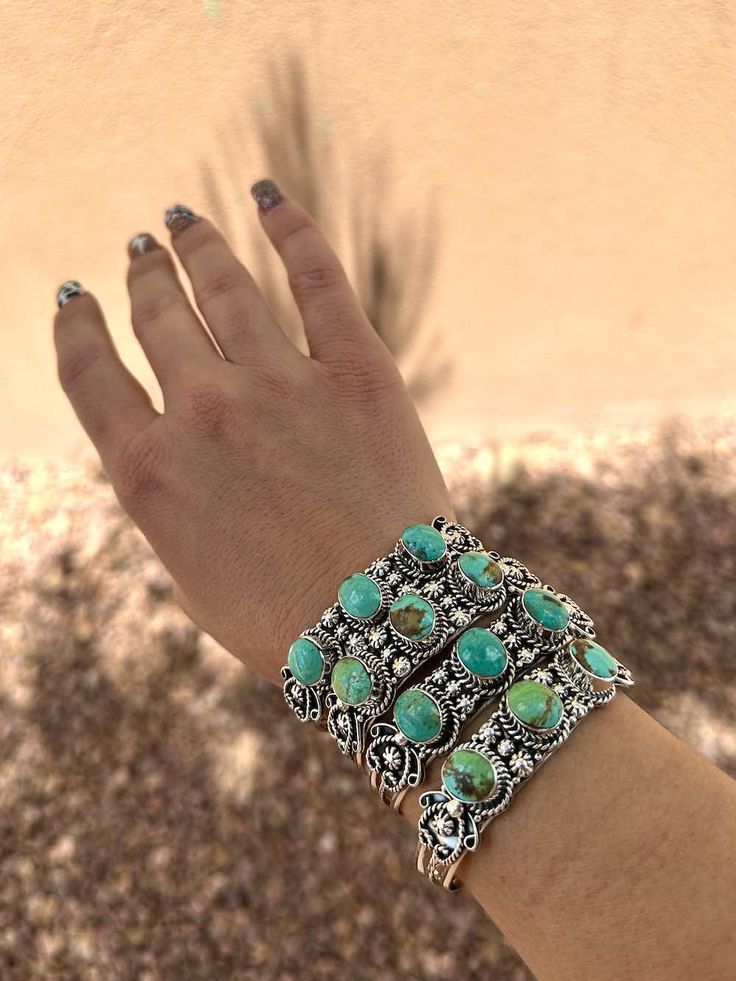 LOVE these stunning cuffs!Handcrafted cuff bracelets with beautiful metal work. 925 Sterling Silver + your choice of Genuine Turquoise or Spiny Oyster.Diné crafted to purrrrfection. Diameter: 61-64mm Suits Medium Wrists.