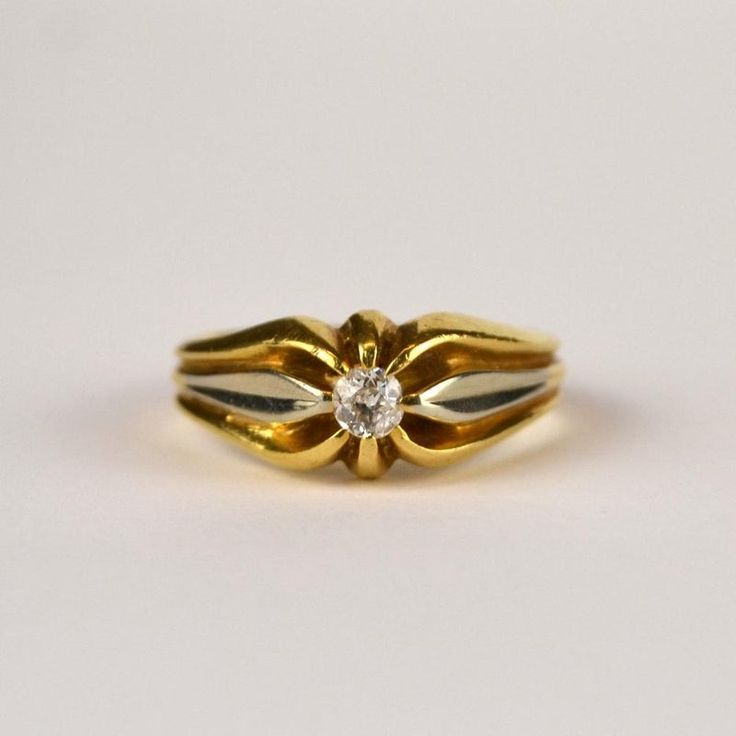 Gold and silver ring in the form of a signet ring with a diamond France Material :gold,silver,diamond Weight: 8.22 g Assay: AU 750=18 ct  Size: AU 8.5 , Erupean 19 , diameter 18.75mm  Creation time: XX years  Ring height: 23 mm, width: 20 mm  Ring verified by a jewellery and gemstone expert. The ring comes with a certificate from our stationary shop in Krakow in English with a and a jewellery box. Diamond Yellow Gold Hallmarked Signet Ring, Vintage White Gold Signet Ring With Center Stone, Yellow Gold Diamond Signet Ring Hallmarked, Timeless Gold Engraved Ring With Single Diamond, Vintage Gold Signet Ring With Single Diamond, Antique Yellow Gold Jewelry With Single Diamond, Vintage Yellow Gold Signet Ring With Single Diamond, Timeless Formal Signet Ring With Diamond Accents, Signet Ring With Single Cut Diamonds As Gift