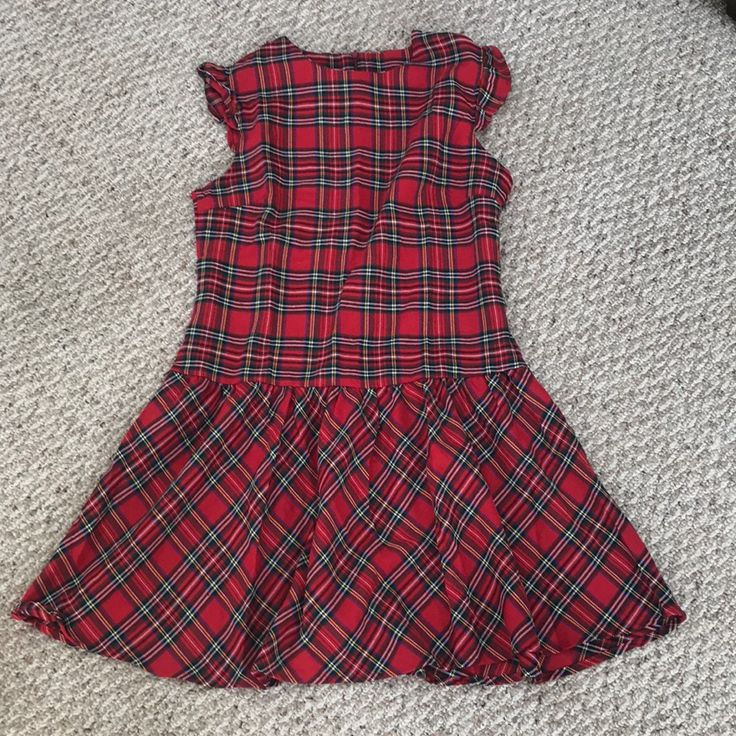 Women’s Red Plaid Dress. Never Worn. Size Large. Prob Fits Like An 8. Drop Waist. Zipper In The Back. Ruffle Detail On The Sleeve. Matching Girls Dress Also Listed. Casual Mini Dress For Holiday, Sleeveless Plaid Dress For Party, Casual Red Mini Dress For Holiday, Casual Plaid Dress For Parties, Red Casual Holiday Dress, Red Fitted Plaid Dress With Short Sleeves, Red Sleeveless Plaid Dress For Spring, Fitted Red Plaid Dress With Short Sleeves, Casual Plaid Holiday Dress