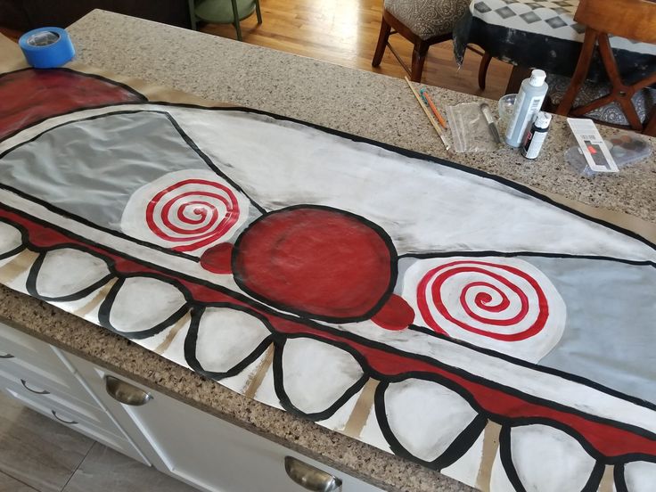 the kitchen counter has been decorated with an image of a clown's mouth on it