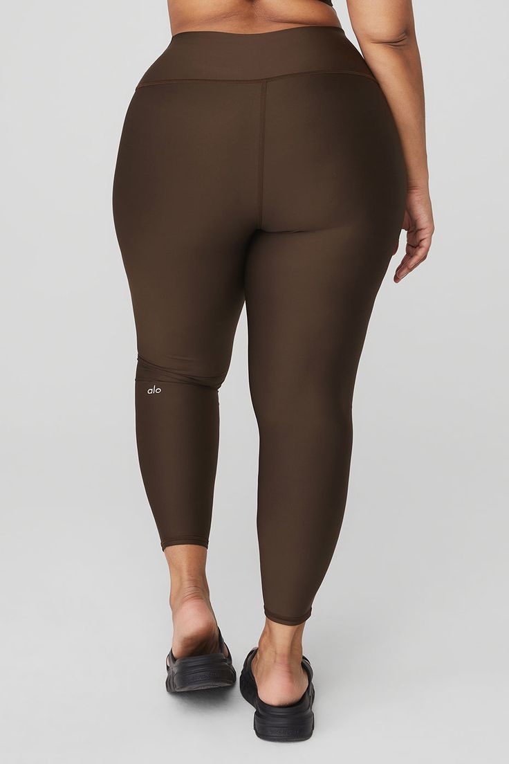 Wondering why these leggings are a fan favorite? Maybe it’s the sculpting, subtly sheeny, high-compression Airlift fabric. Or the fact that they fit like a glove, complete with a wide, double-layered waistband for a holds-you-in feel. Or the ⅞ length hems that are perfect for petites or an above-the-ankle fit. Pick your color and get ready to wear yours on repeat. Alo Yoga Nylon Training Bottoms, Sleek High-stretch Nylon Activewear, Sleek Stretch Nylon Activewear, Compressive Nylon Activewear By Alo Yoga, Alo Yoga Compressive Nylon Activewear, Alo Yoga High Stretch Leggings For Sports, High Stretch Alo Yoga Leggings For Sports, Functional Nylon Leggings With Contoured Waistband, Alo Yoga Compressive Sporty Leggings