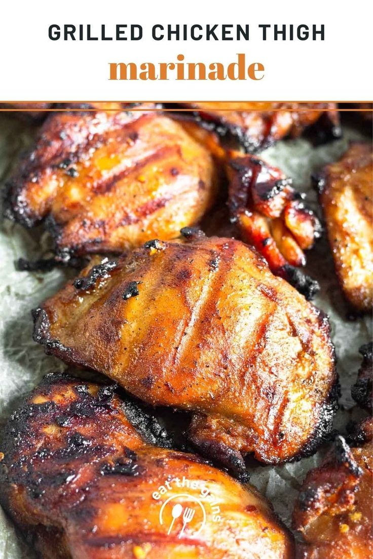 grilled chicken pieces sitting on top of a piece of paper