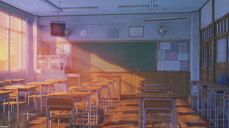 an empty classroom with desks and chairs