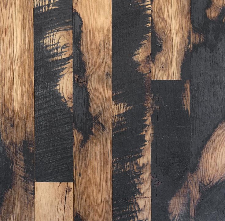 an image of wood flooring that looks like it has been painted black and brown