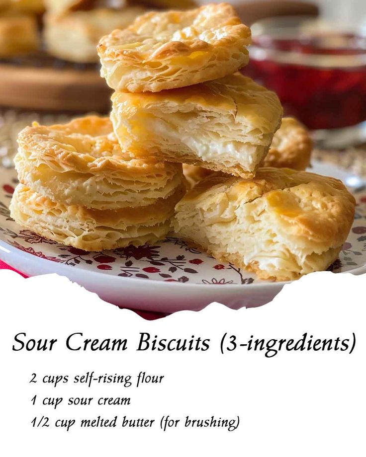 some biscuits stacked on top of each other in front of a plate with the words sour cream biscuits 3 - ingredient